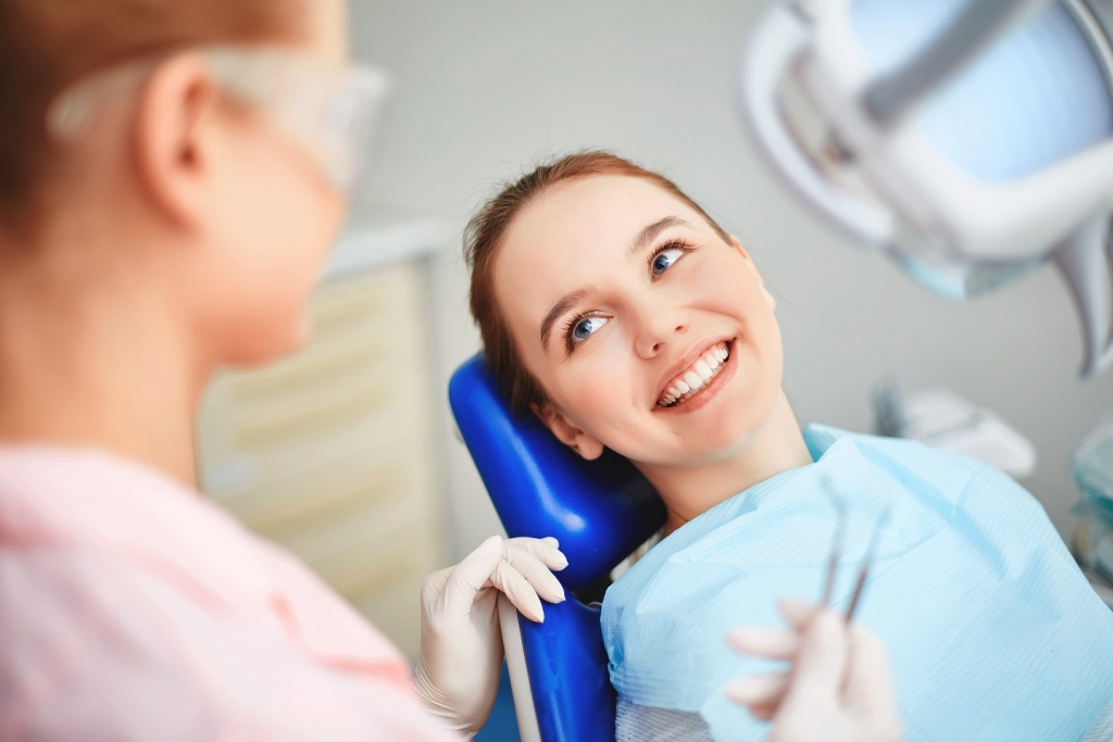 Woman sitting in dental chair